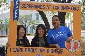 Ladies with photo frame - free kidney screening