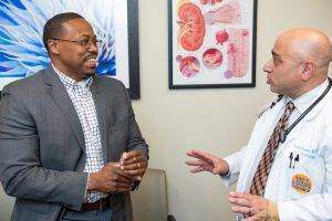 Dr. Broumand informing a healthy volunteer on Research Trials for Kidney Disease Treatments